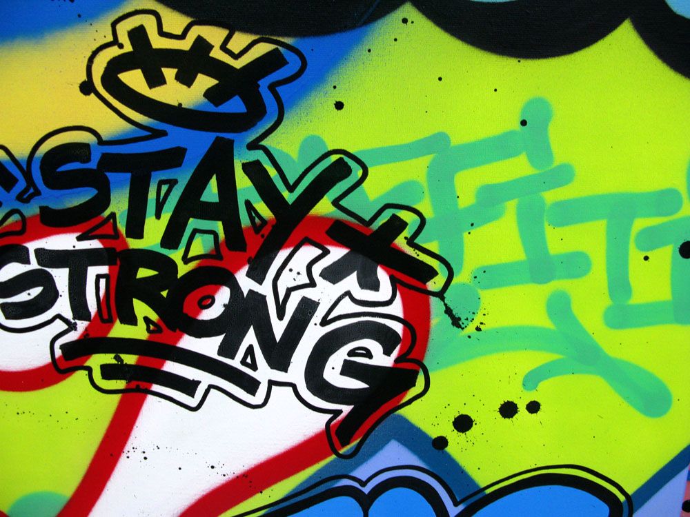 Tableau de KENY a pour titre STAY STRONG style graffiti, street art dim : KENYprix:550