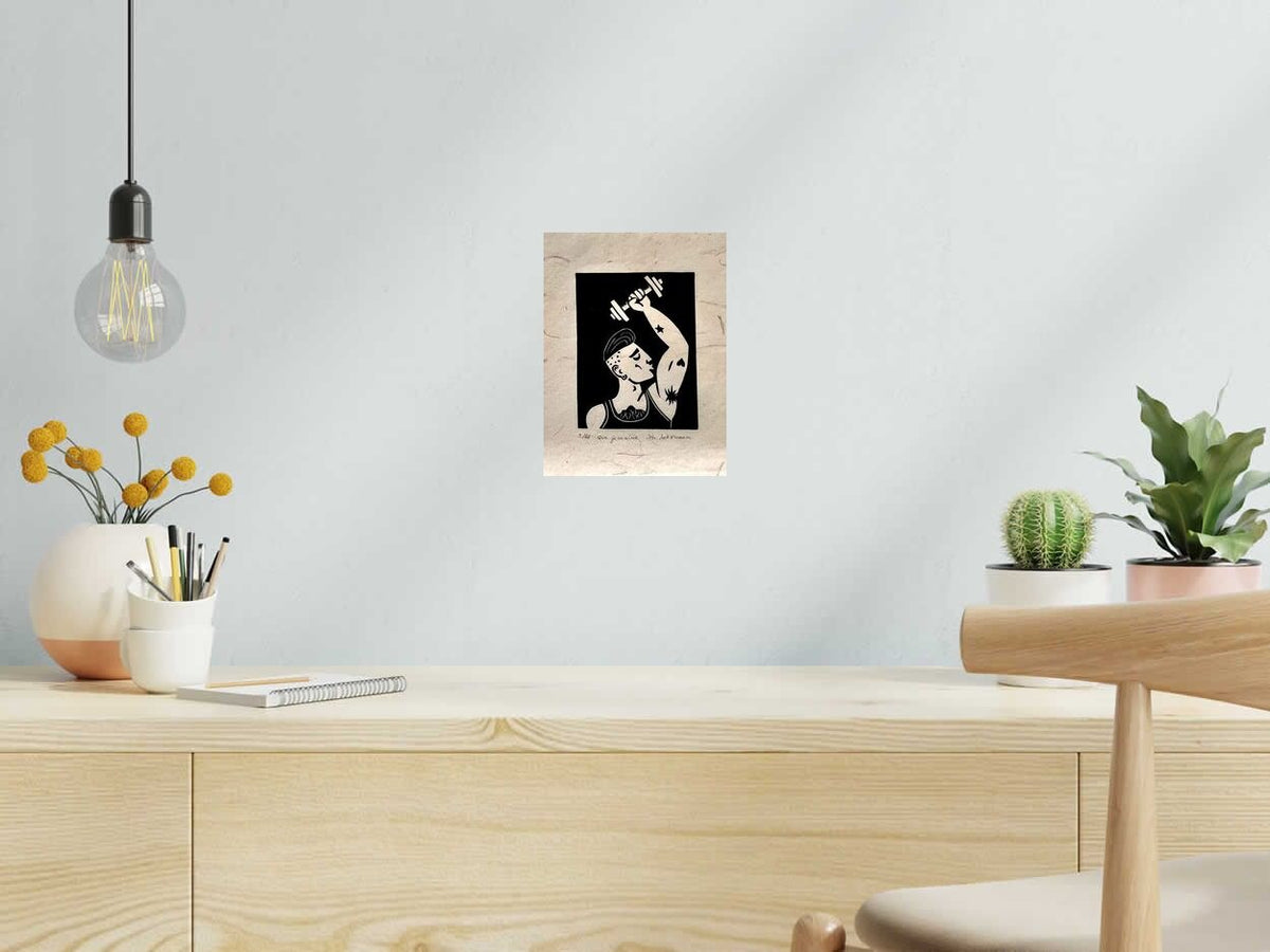Linogravure QUE JE M'AIME de PHILIPPE ACHERMANN dans un intérieur – 18 × 24 cm