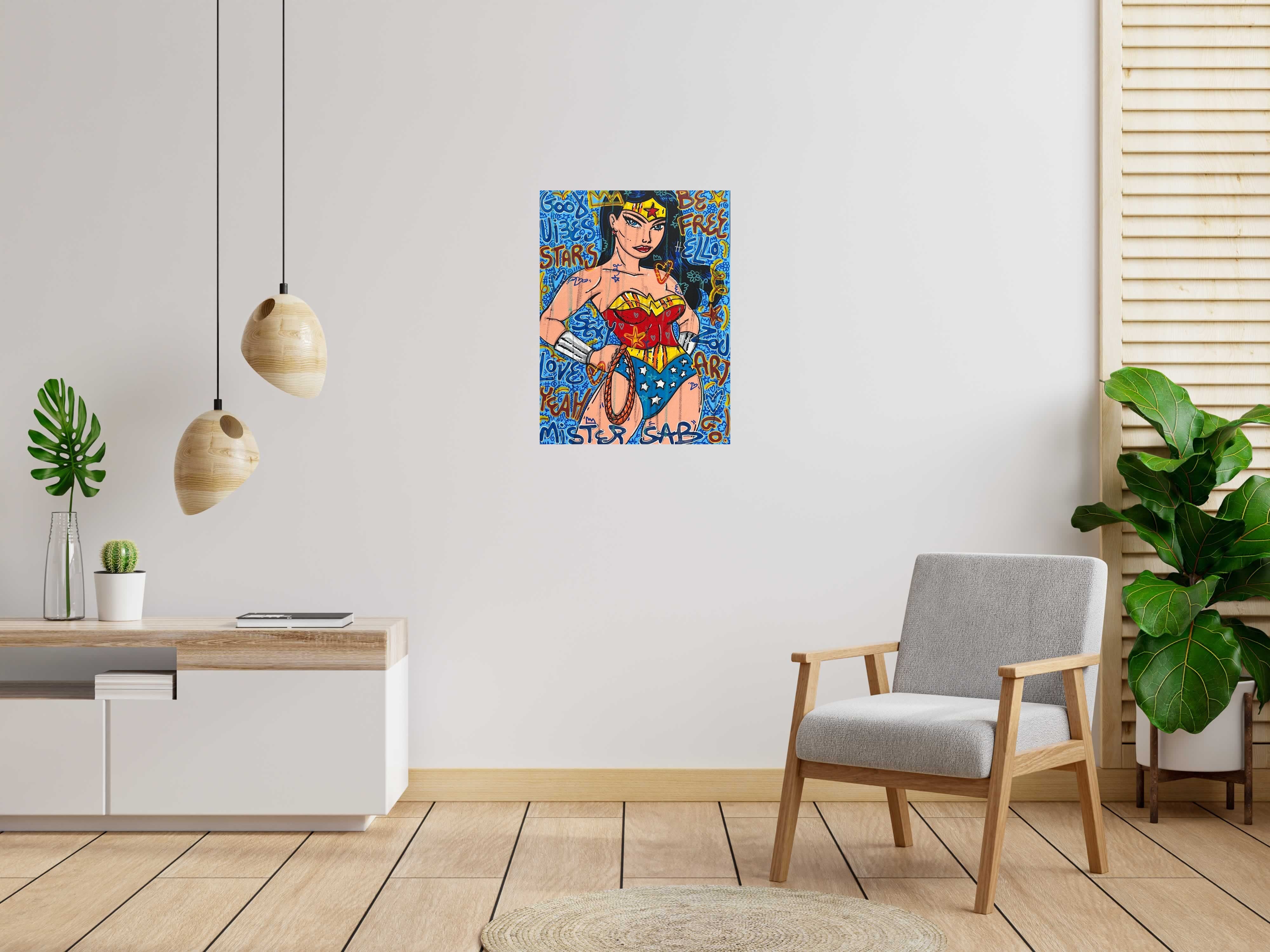 Peinture Good vibes Wonder Woman de RICO SAB dans un intérieur – 60 × 80 cm